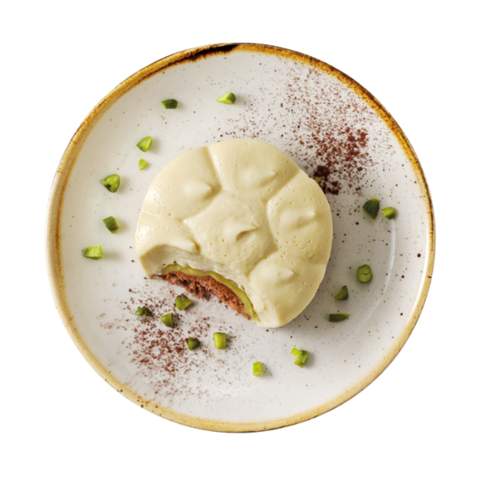 Hofmanns Shop Tiramisu Pistazie: runde Nachspeise mit Mascarponecreme und grünen Pistazien.