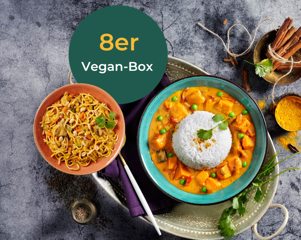 Die „8er Vegan-Box“ von Hofmanns Shop bietet eine köstliche und praktische vegane Mahlzeit, die Reis mit Curry und einer Beilage Nudeln enthält, perfekt für alle, die nach veganen Gerichten suchen.